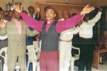 pastorwithcongregation.jpg